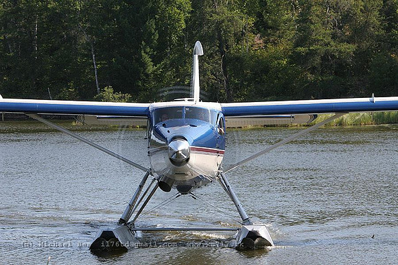 068923_dhc3turbootter(float)_+OI_cfsor_20060727_nestorfalls(on)_IMG_2946